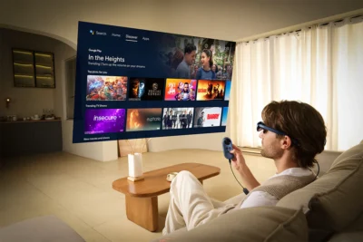 a man with Rokid AR glasses and Rokid Station 1100x 3